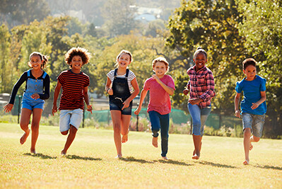 Image of Children running in the park